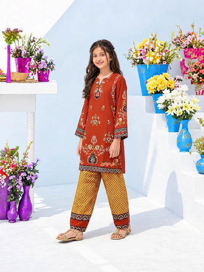 Girl wearing Amirah Rust Heritage rust red printed kurti with mustard yellow wide-leg trousers